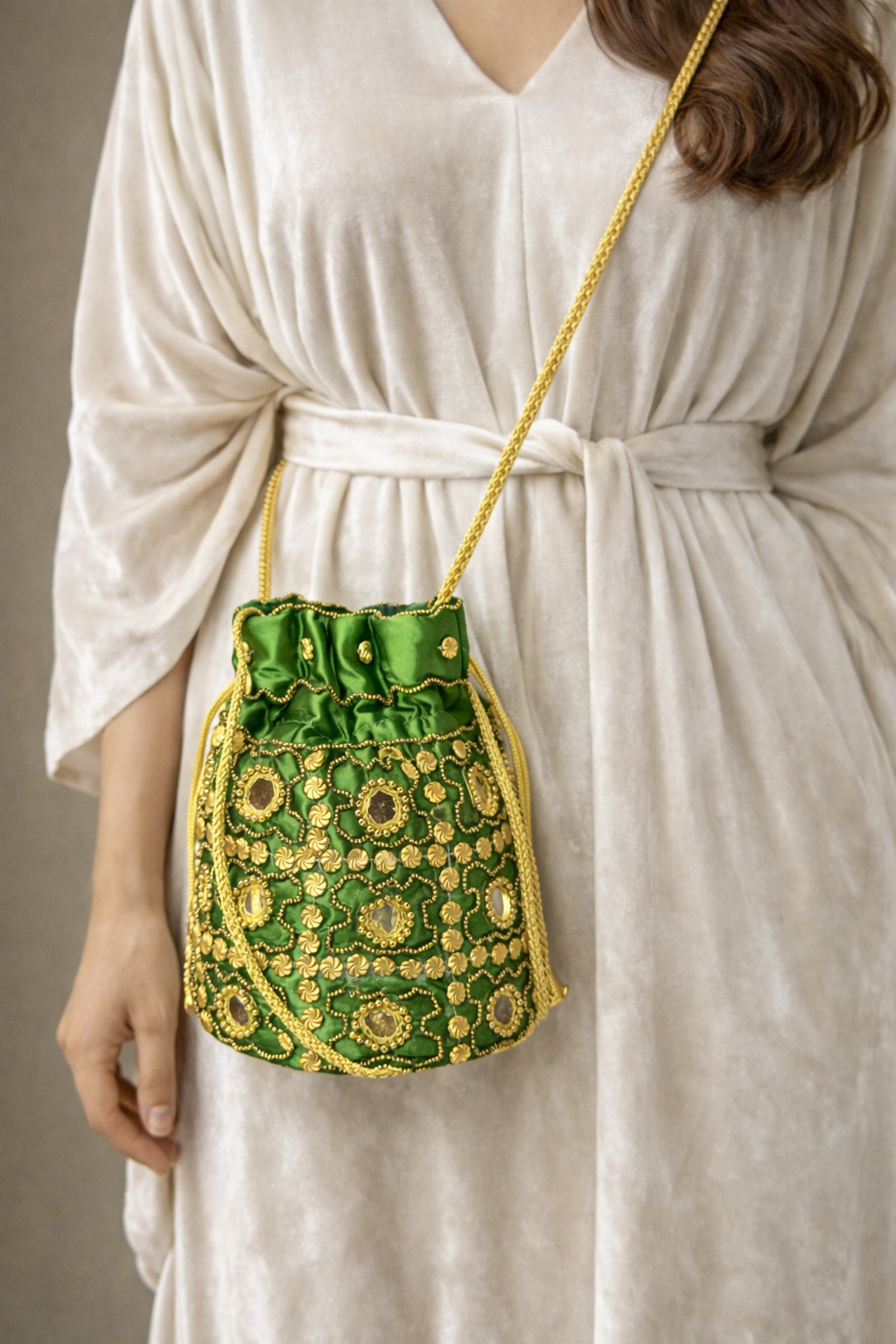 green embroidered potli bag