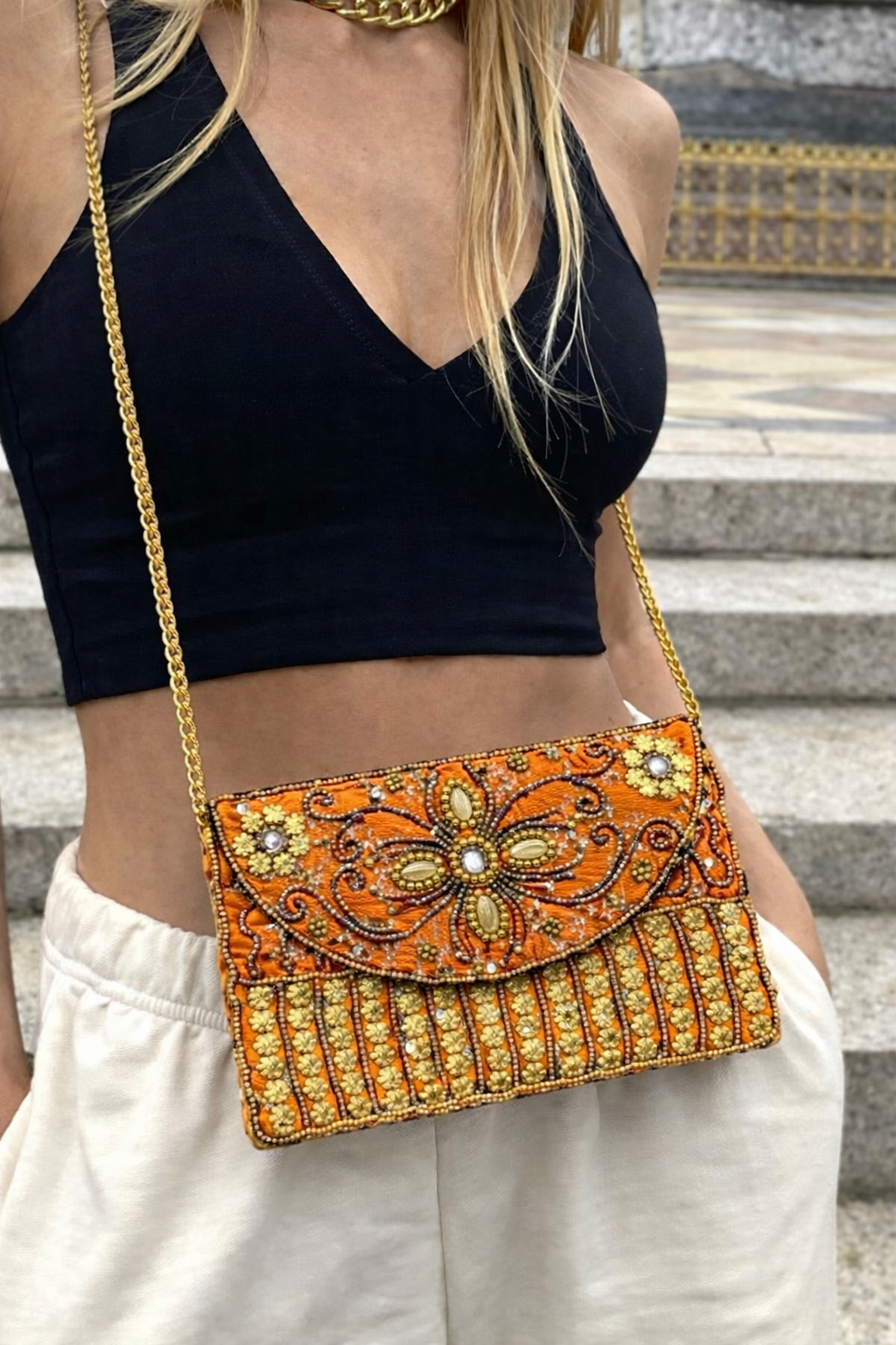 orange embroidered indian mini clutch