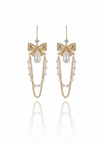 golden coquette bow & pearl drop earrings