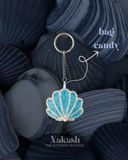 teal seashell beaded charm